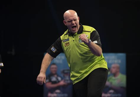 Van Gerwen exits Grand Slam but Littler progresses 